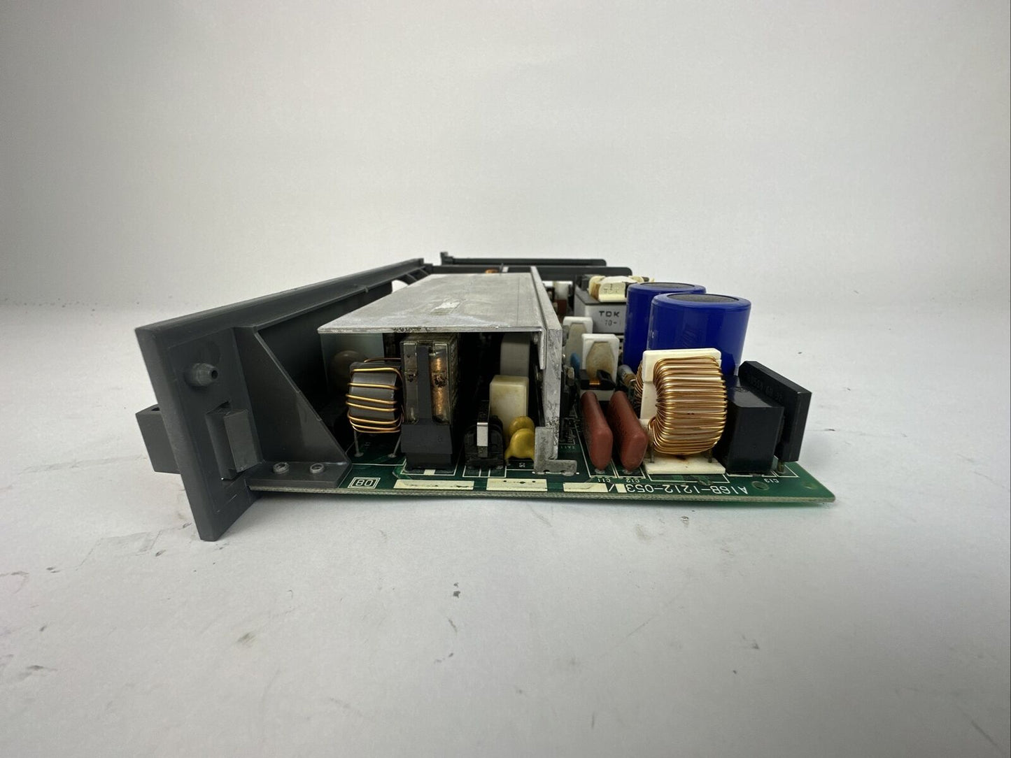 FANUC A16B-1212-053 PSU BI POWER SUPPLY CIRCUIT BOARD HAS CRACKE PLASTIC