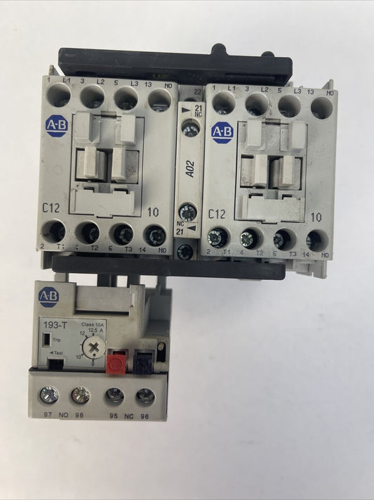 ALLEN BRADLEY REVERSING STARTER (104-C12DJ22 600VAC 32A 10HP + 193-T1AC12)