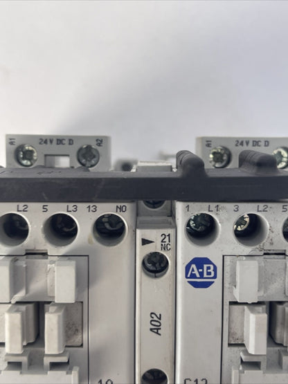 ALLEN BRADLEY REVERSING STARTER (104-C12DJ22 600VAC 32A 10HP + 193-T1AC12)