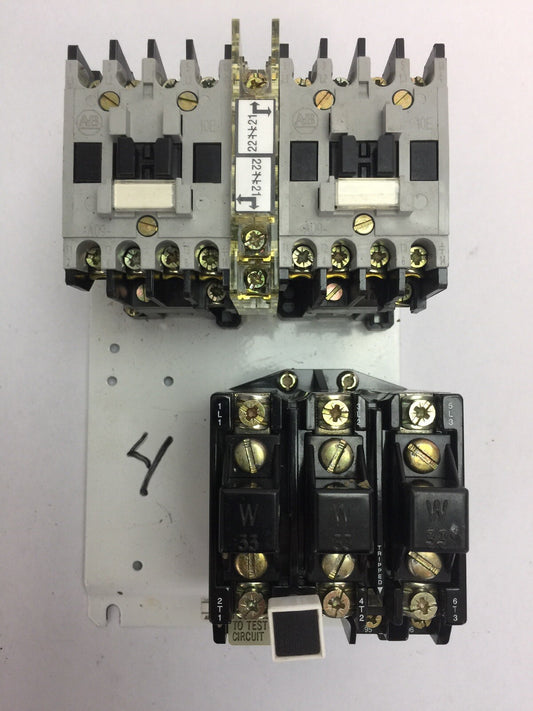 ALLEN BRADLEY 105-A09NDJ0V REVERSING STARTER 100-A09ND3 600VAC 9A 592-J0V16 W33