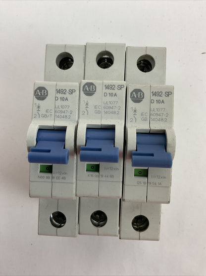 ALLEN BRADLEY 1492-SPM1D100 CIRCUIT BREAKER 277VAC 48VDC SER D 10A (LOT OF 3)